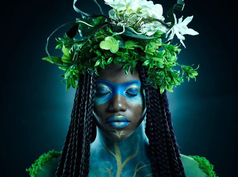 black woman plant crown and beauty of face with m